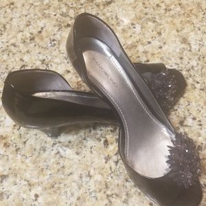 Bandolino studded open toe pumps.